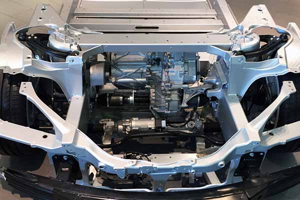 Vacuum impregnated aluminum car frame